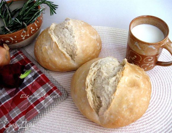 Вынуть хлеб из духовки, положить на решетку, дать на остывание минут 30.