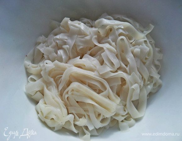 Откинуть на сито, дать стечь.