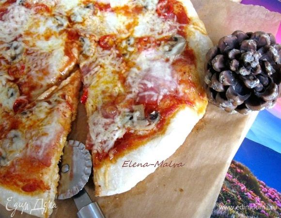 Это кусочек для вас. Приятного аппетита! 
На фото шишка с той самой пинии у пиццерии.