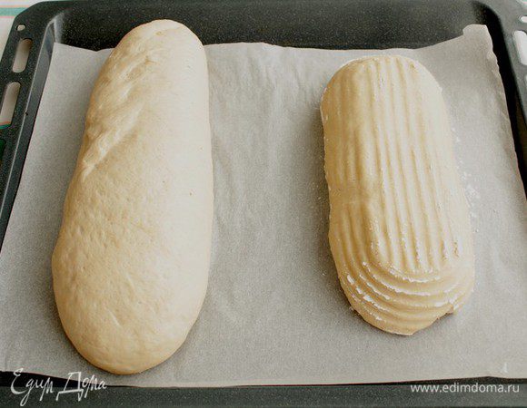 Накрываем  и оставляем на 30-50 минут в теплом месте (один батон расстаивался в корзинке). За это время  батоны хорошо увеличились в размере, отправляем их на выпечку.