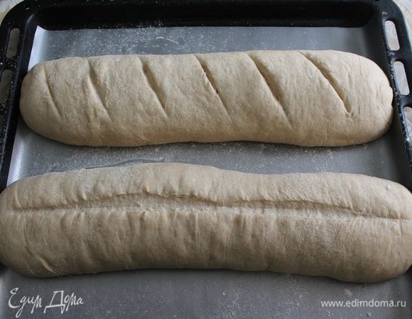 Оставить на 20 минут, после сделать надрезы (я попробовала по, вдоль и поперек) и выпекать в горячей духовке около 45 минут.