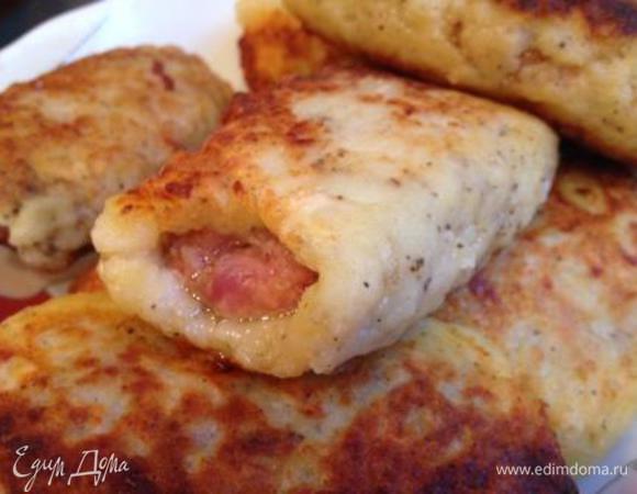 Сложить все рулетики в огнеупорную посуду и поставить в разогретую до 200 градусов духовку на 30 минут.