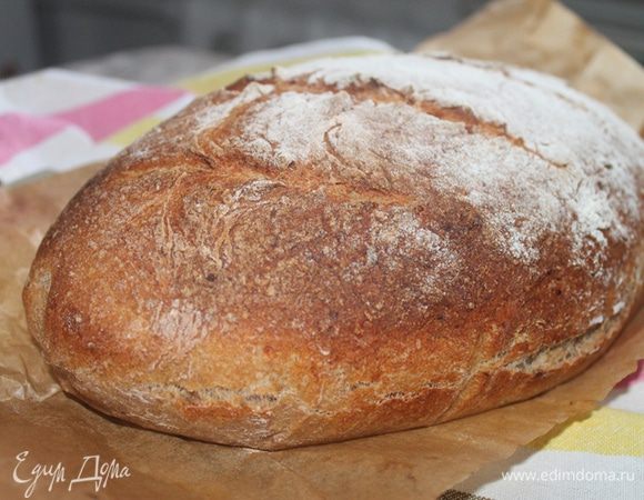 Выпекаем 10 минут с паром. Затем убираем воду, температуру снижаем до 210 градусов и печем еще 30 минут. В любом случае через указанное время постучите по корочке хлеба, если звук глухой значит хлеб готов.