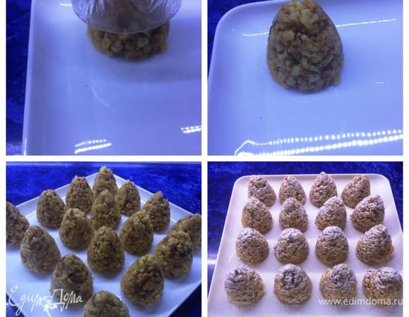 Затем переворачиваем и вытряхиваем шишку из рюмки. 
Нужна некоторая сноровка, поэтому для начала вытряхивайте печенье на руку, чтобы случайно рюмку не разбить о блюдо и не пораниться. 
Таким образом поступаем со всем тестом.
Наши шишки готовы.
Последний штрих — это посыпать сахарной пудрой и "шишки" в снегу готовы.
Обычно я готовлю вечером, а утром уже можно их есть. 
Печенье как-бы немного "цементируется" и не разваливается в руках.
