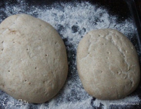 Вот так подросло тесто после последней расстойки. У меня глаз не совсем алмаз, поэтому буханочки не совсем ровные :)