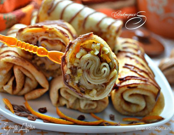 Полейте готовые блинчики растопленным шоколадом и подавайте к столу. Приятного вам аппетита!