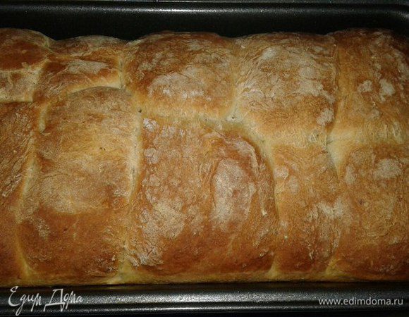 Духовку разогреть до 200-220°C и выпекать хлеб до золотистой корочки 30-40 минут.