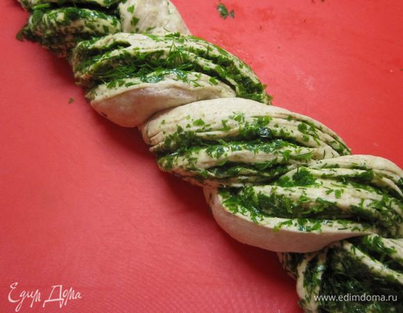 Разрезать по всей длине на 2 части и переплести.