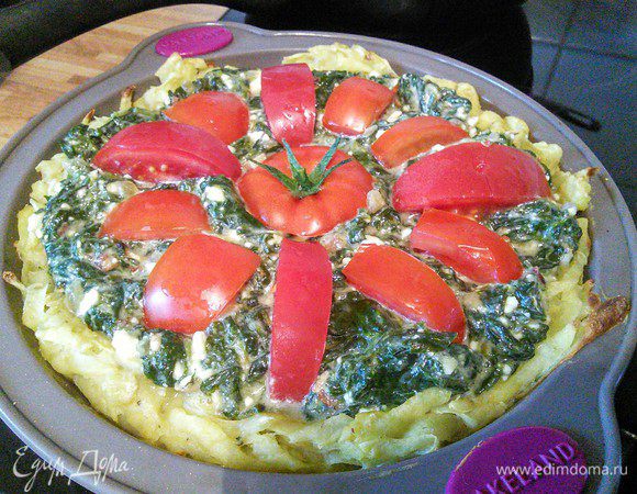 Смешать со шпинатом, распределить в картофельном тесте, распределить помидоры и оставшуюся фету и допекать еще приблизительно 45 мин. 