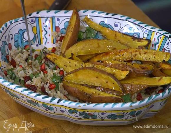 Выложить в рис запеченный батат вместе с маслом и еще раз перемешать.