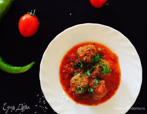 Готовые тефтели посыпать сверху петрушкой и пармезаном. Приятного аппетита!