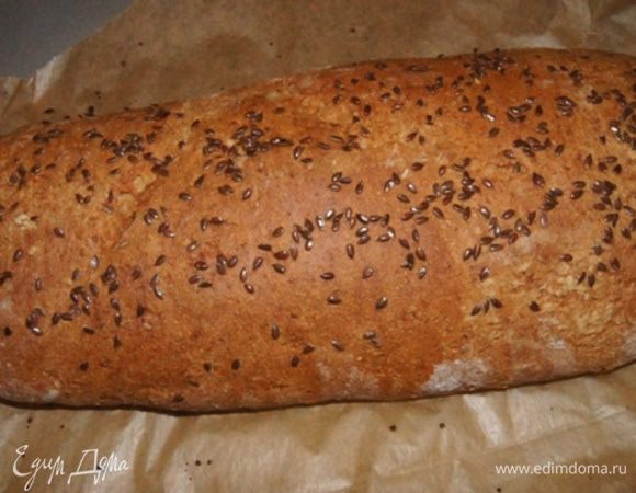 Духовку разогреть до 190°С. Выпекать хлеб 45 минут. Если сильно подрумянится убавить температуру до 160°С. Хлеб полностью остудить.