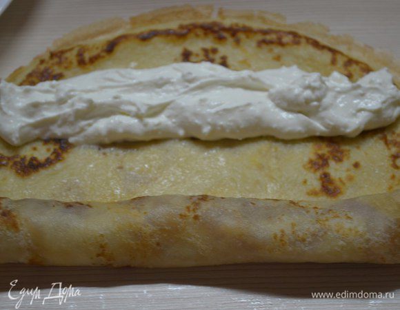 И свернуть каждый край до середины.