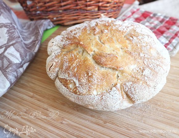 Спустя минут 10-15 вынуть хлеб из казана. 