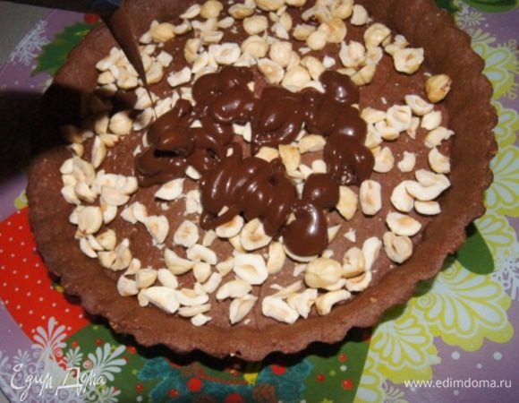 Наполнить тарт ганашем, разровнять.