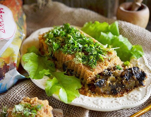 Выпекать в разогретой до 190°С духовке около часа, накрыв первые полчаса фольгой. При подаче посыпать рубленой зеленью.