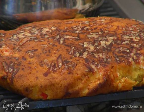 Вынуть готовый хлеб из формы, освободить от бумаги и выложить остывать на решетку.