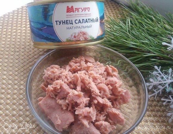 С тунца ТМ «Магуро» слить жидкость.