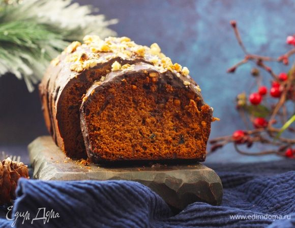 Шоколад растопить на водяной бане, облить пряник (или смазать кисточкой). Обсыпать орехами.