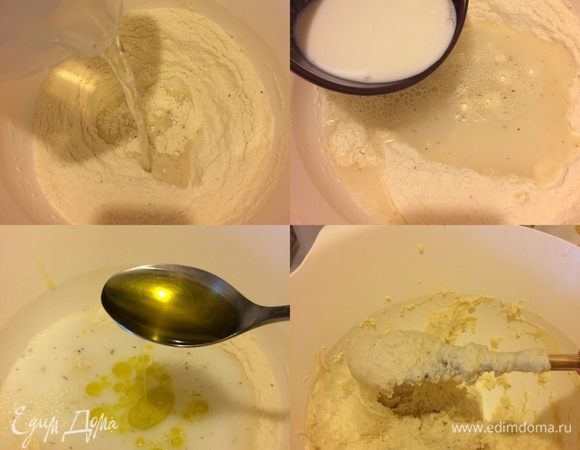 В муке сделать лунку, добавить теплую воду, теплое молоко, 2 ст. л. масла и все хорошо перемешать. У нас получится довольно липкое тесто.