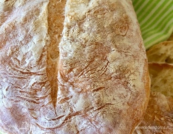 Готовый хлеб достать и полностью остудить на решетке.