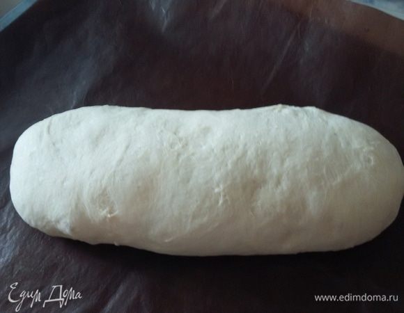Через два часа достать тесто, оформить в колобок и дать ему полежать 10 минут. После этого сформировать батон и дать постоять час.