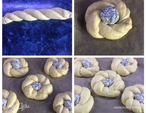 Соединить по два жгута и переплести. Скрутить в колечко и выложить на лист с пергаментом на хорошем расстоянии друг от друга. У меня в центре лишняя булка, нужно было всего 4 положить на противень, т.к. они увеличиваются в объеме и стали касаться друг друга. Оставить булки минимум на 30 минут.