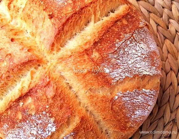 Готовый хлеб достать и полностью остудить на решетке.