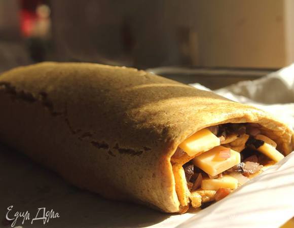 Отправить его в духовку на 5 минут + пару минут гриля.