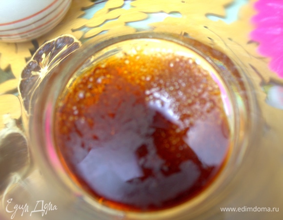 Влить ложечку черного бальзама.