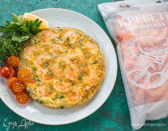 Запекайте фриттату при 180°C в течение 15–20 минут. Перед подачей полейте блюдо лимонным соком и украсьте помидорами черри. Приятного аппетита!