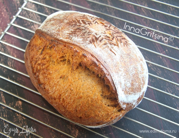 Выпекать 15 минут при 250°C с паром, затем еще 25 минут без пара при 180°C (ориентируйтесь на свою духовку). Моя духовка электрическая с конвекцией.