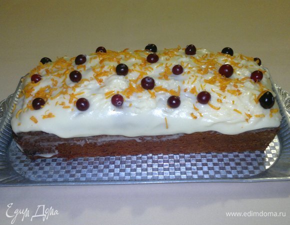 Украсить цедрой апельсина и клюквой.