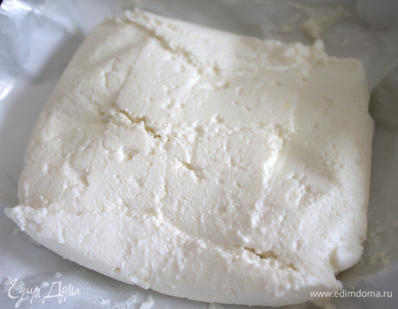 Добавить 2 пачки творога (6%).