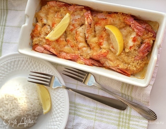 Подавать с рисом. Сверху можно украсить дольками лимона.