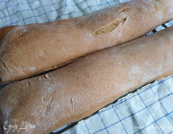 Ставим в разогретую до 180°C духовку. Печем первые 25 минут при 180°C с подачей пара. Затем температуру снижаем до 150°C и выпекаем в течение 25 минут без пара. Вынимаем, даем остыть.