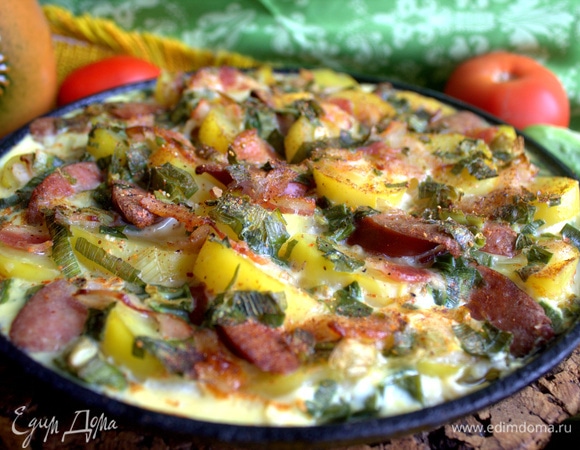 Запекать, пока омлетная масса не схватится, 15–20 минут при 180–190°C.