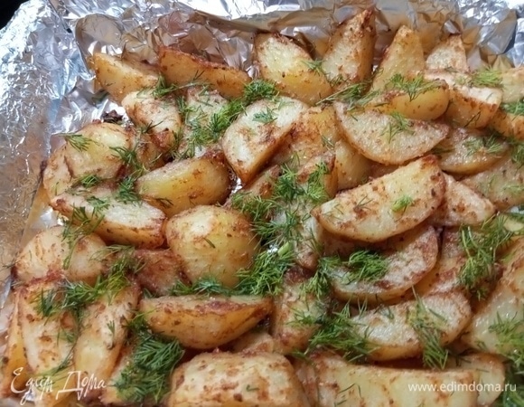 Поставить в разогретую до 200°C духовку. Запекать 30 минут. Посыпать зеленью.