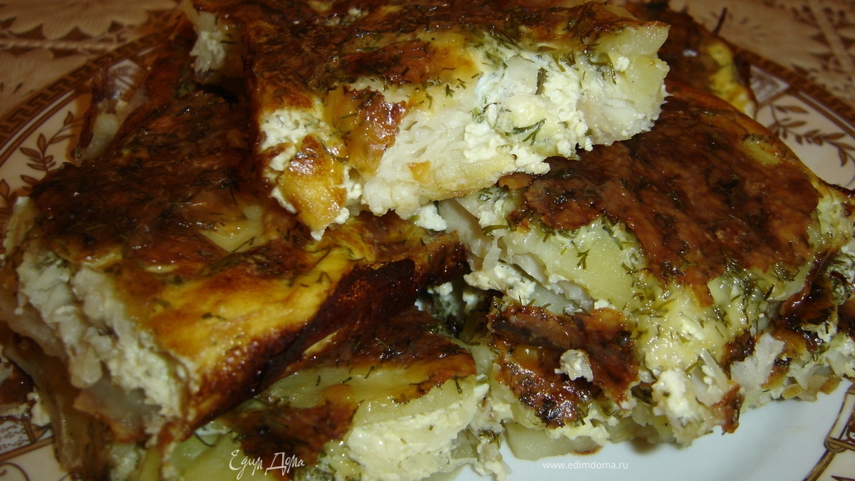 Тилапия с картофелем под соусом