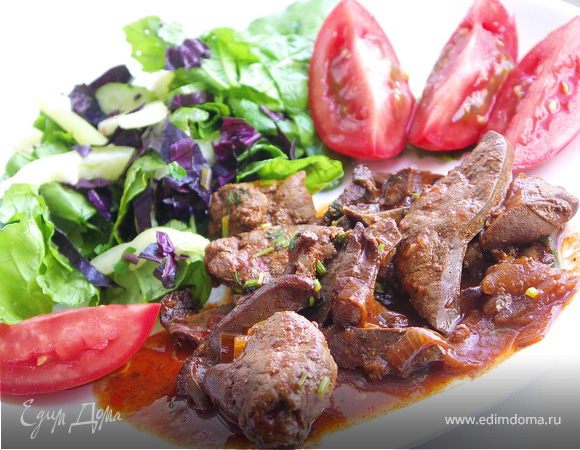 Потрошка барашка тушёные в томатном соусе с чесноком и белым вином.