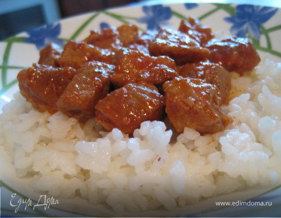 Свинина тушёная в томатах