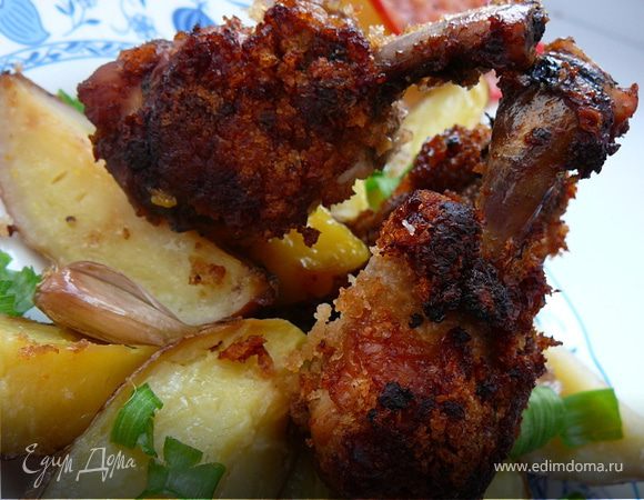 Куриные крылышки с картофелем.