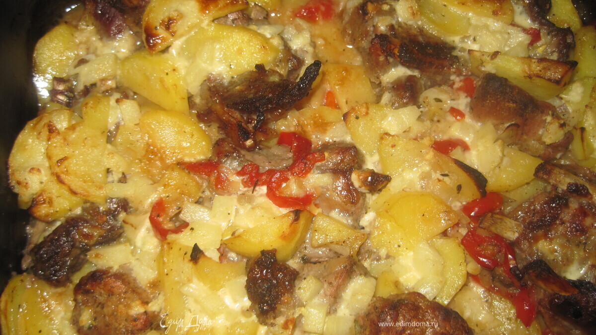 Запеченные ребрышки в сметанном соусе