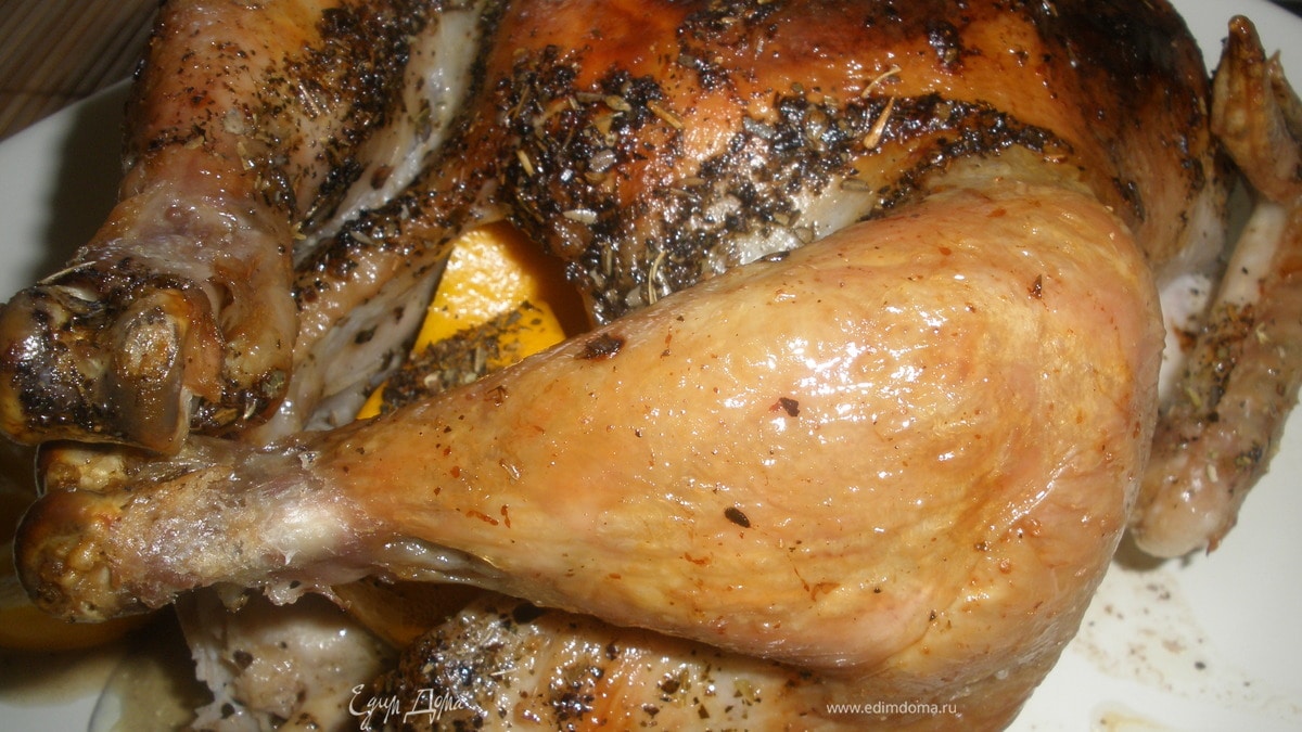 Курица запеченая с лимонами и орегано