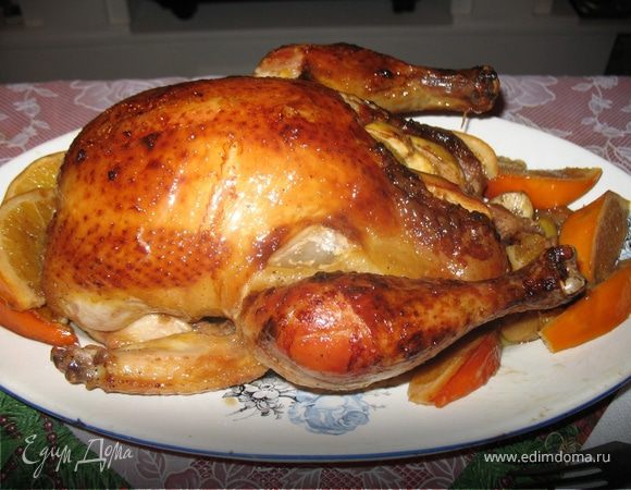 Утка, запеченная с апельсинами и яблоками