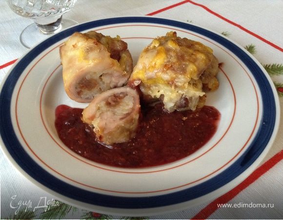 Куриные бедрышки, фаршированные рисом, сыром и изюмом Куриные бедрышки, фаршированные рисом, сыром и изюмом