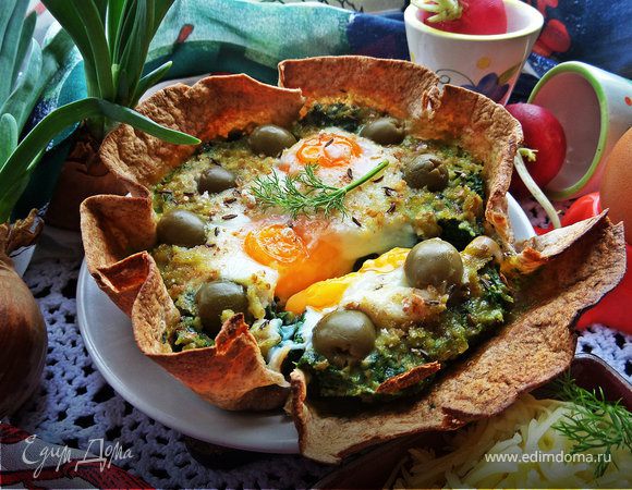 Глазунья, запечённая в шпинате