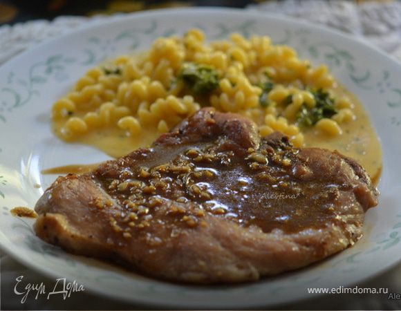 Свиные отбивные с розмарином в апельсиновом соусе Свиные отбивные с розмарином в апельсиновом соусе
