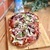 Пицца на римском тесте с сыром буратта и прошутто