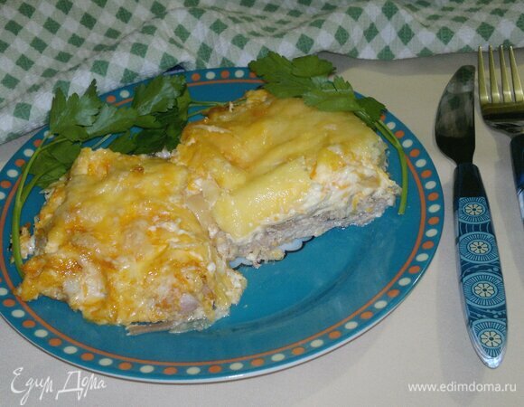 Свинина под сырно-овощной шапкой